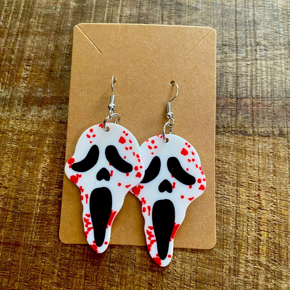Bloody ghost face earrings.